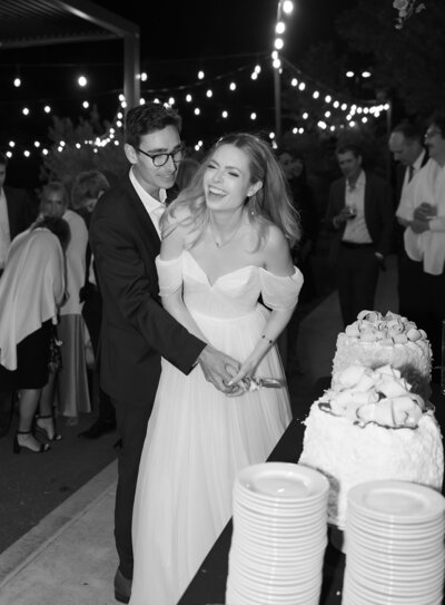 outdoor destination wedding ceremony along the waterline
