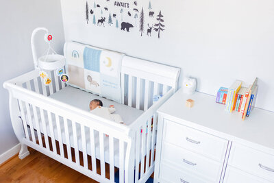 A newborn boy in his crib in his Northern VA home.