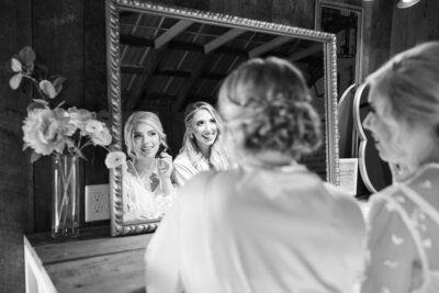 Kentucky bride looking into mirror