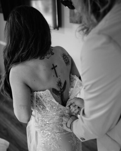 Couple getting ready together on their wedding day