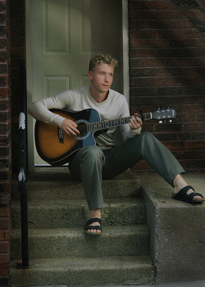 We did a few different sets including his music love, and his shades and mix-match birkenstock spirit... but then...  We did the dumpster. Harpers Bazzar and Wes Anderson Style.
