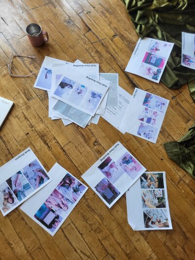 Flat lay of branding design pages on wooden floor used for blog on SEO tips for new bloggers