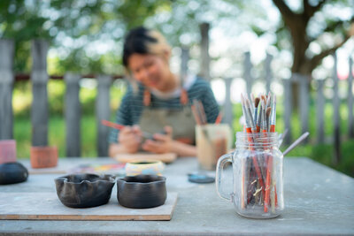 in-the-pottery-workshop-asian-woman-is-engaged-in-2023-12-12-23-07-07-utc