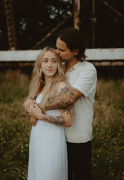 Couple  poses for engagement photos in Nashville, Tennessee