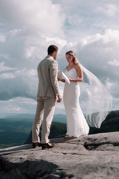 photo of bride and groom during their mountain top elopement in charleviox quebec