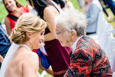 Candid moment with bride and grandma Michigan wedding photography