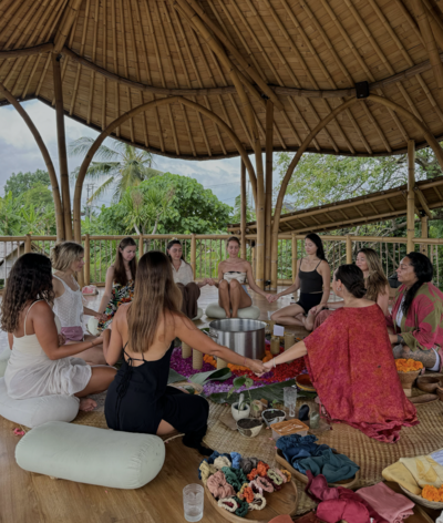 A girls hand writing in her journal