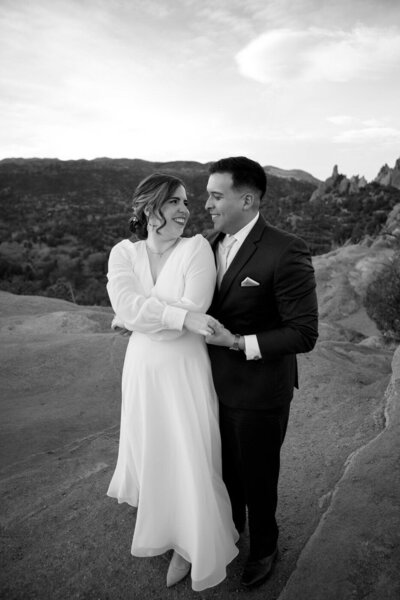 Bride and groom dance atop a rock in Garden of the Gods, Colorado.
