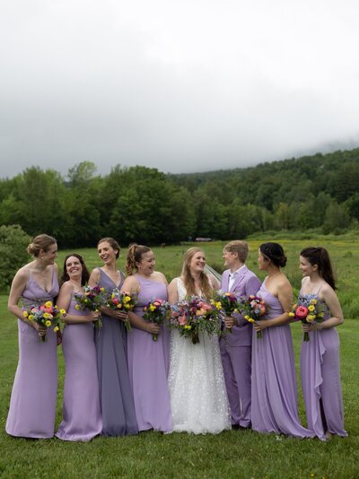 bridesmaids in a field before Heirloom One edit