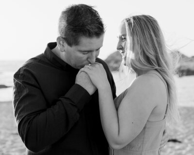 Kissing on the hand engagement picture