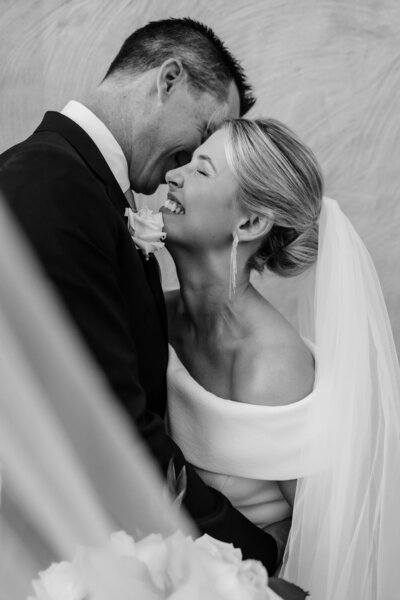 Black and white, natural candid wedding portrait.
