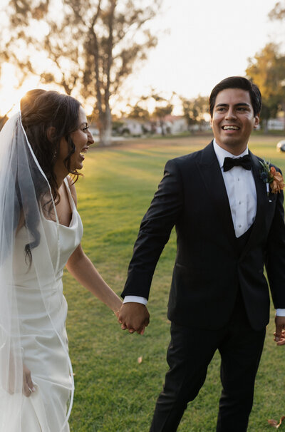 Bride and Groom under wedding veil
