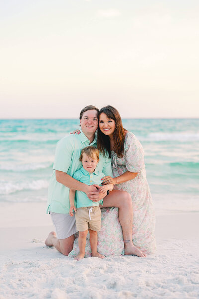 Josie Kitch posing with family on the beach
