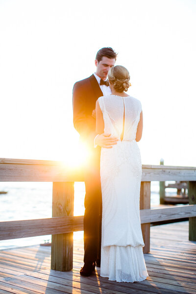 Bride and groom kiss after wedding ceremony at Bald Head Island