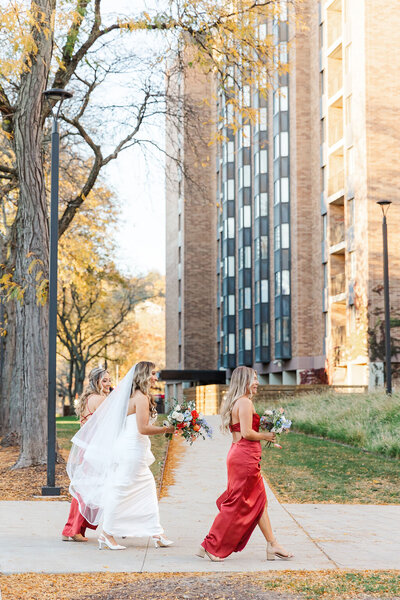 Photo of bride walking with her girls to the ceremony.