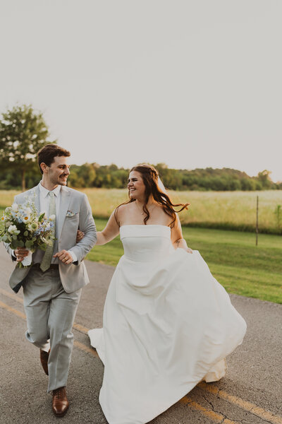 bride and groom running