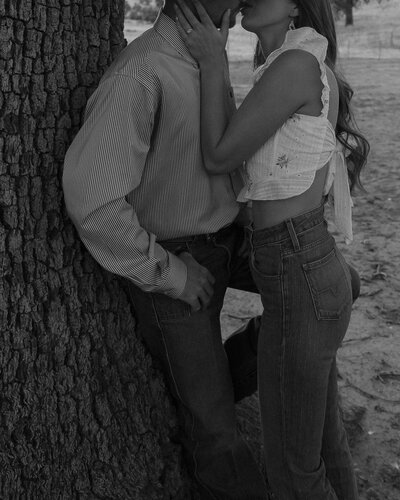 Couples Engagement Photos black and white kissing candid in San Luis Obispo