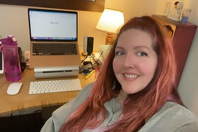 Brie at her desk with her macbook