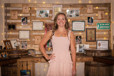 A young woman poses in the Country Strong barn.