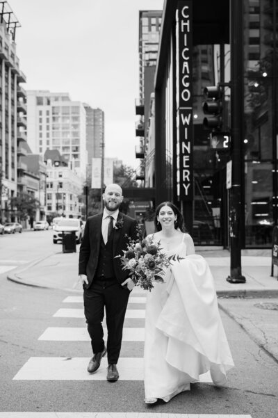 Couple walk across the street at Chicago WInery