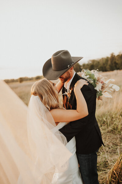 bride smiling at groom