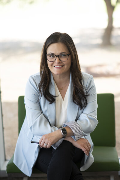 Luisa Kidwell in a blue blazer sitting and smiling – Career and Communication Coach at Kidwell Coaching and Consulting 6