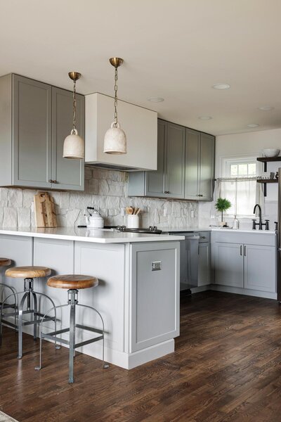 Mountain Cottage project feature image of a light-filled kitchen