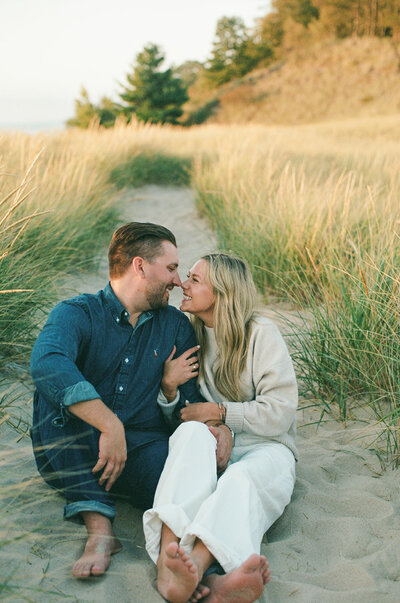 couple kissing in river