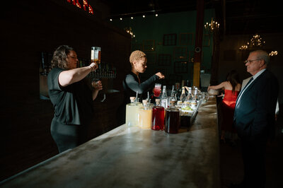 Bartenders drinks at a wedding in Georgia
