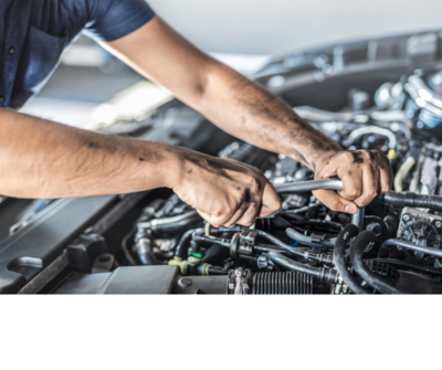 Mechanic working on car engine at local auto shop in Yarmouth, NS