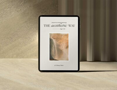 mockup of a tablet device showcasing The Aesthetic Way on a stone background