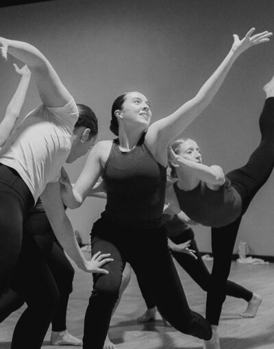 Dancers at ballet barre in Dallas studio