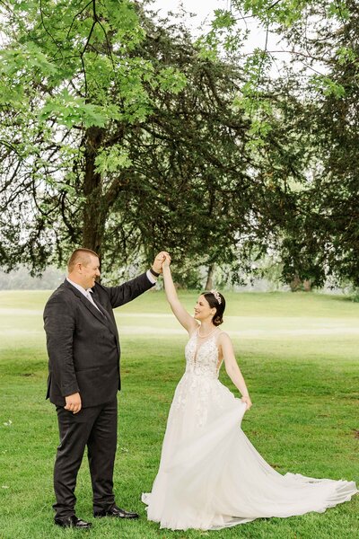 Twirling dancing bride and groom in Wisconsin.