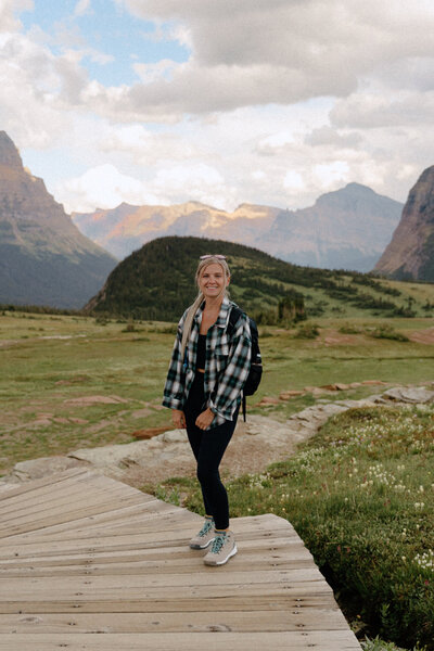 The photographer behind wild summit photo posing for the camera.