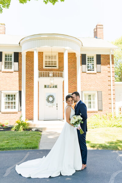 groom looking at bride standing up