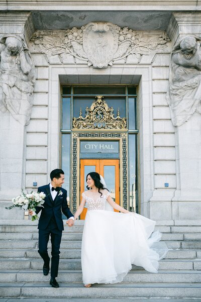 Bride and groom smiling at the camera holding a bouquet | French in Firs Wedding Styled Shoot | Photo by Amy Huang Photography a San Diego Wedding Photographer