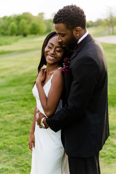 wedding couple hugging capture by Pennsylvania wedding photographer