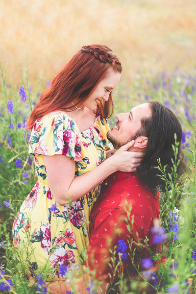 lovers snuggled up for intimate engagement portraits