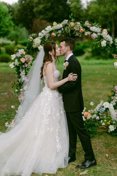 Tender moment between bride and groom at sunset, soft light and romantic atmosphere — Destination Wedding Photographer Portfolio.