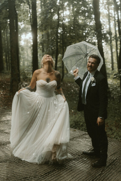 bride and groom hiking up preachers rock mountain in dahlonega geogia