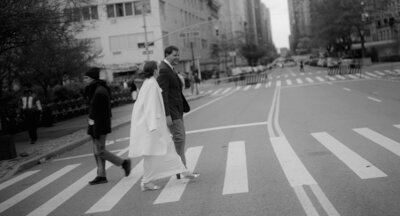 Couple crossing the street in New York City.