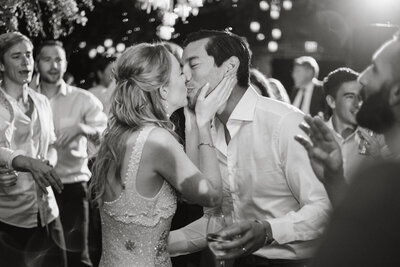 Portrait of the bride and grooms dog wearing a bow tie for their wedding!