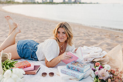 SJB Photos reading on the beach