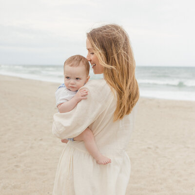 Professional Beach family portrait, taken  by Emily DeLuke Photography in Wrightsville Beach NC