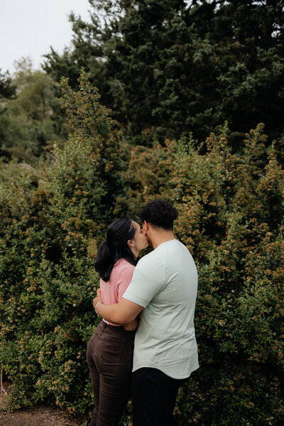 couple kissing each other during engagement session