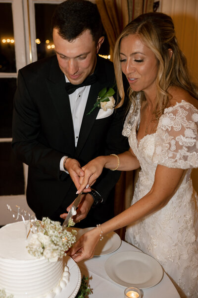 couple holding flowers in hands