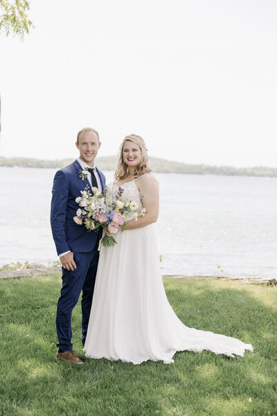 Minnesota bride and groom portrait by lake