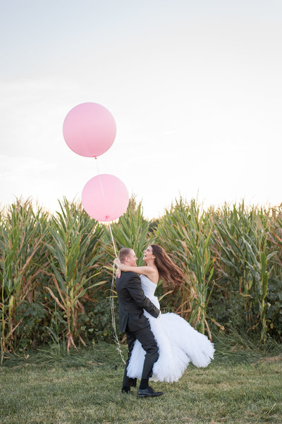 Bride Groom and pink balloons