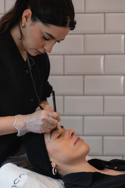 photo of woman getting her eyebrows done at dublin beauty salon
