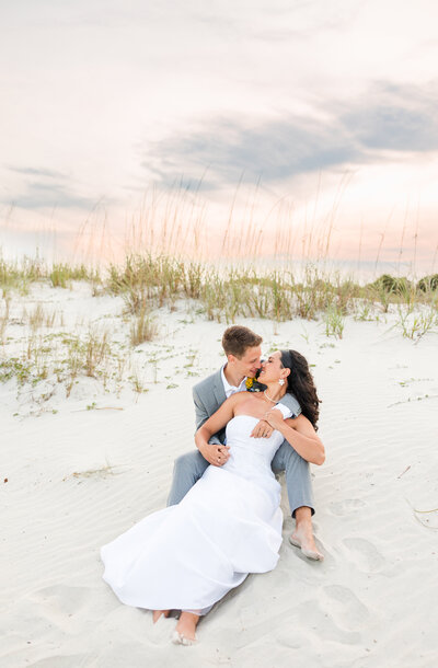 bride and groom smiling at each other